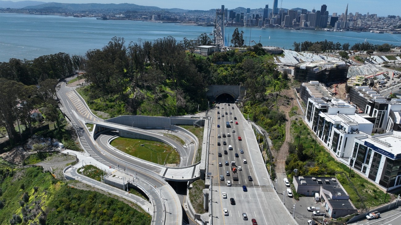 Aerial view of the newly-opened Yerba Buena Island off-ramp at Southgate Road. The San Francisco skyline is visible in the background